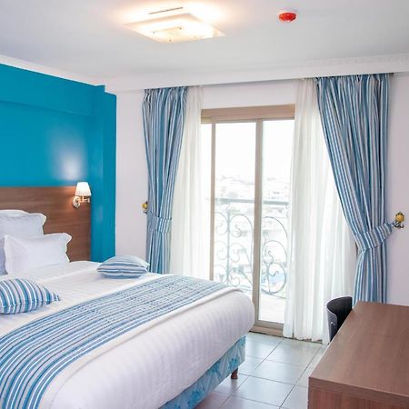 Faya Hotel Дуала Екстериор снимка